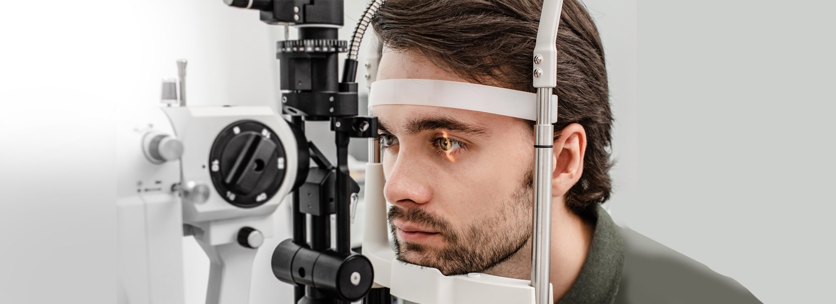 young man during eye exam in Eagan